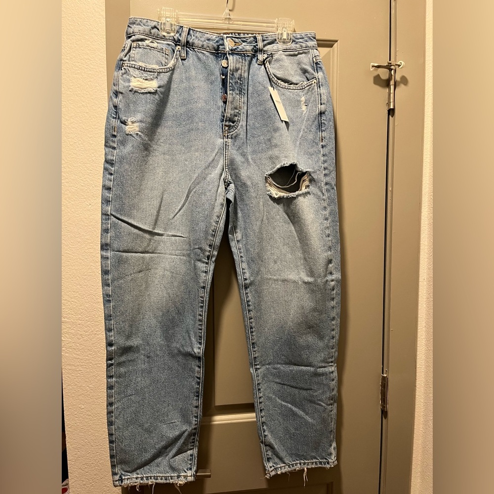 Brand new distressed light wash denim